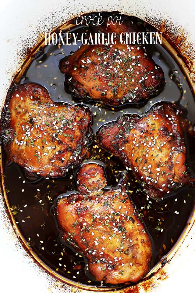 Glazed chicken thighs with bourbon sauce and rice in a bowl